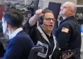 Stock market sinks as AI and interest rate worries grip investors